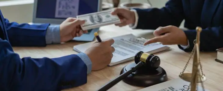 Lawyer receiving debt collection.